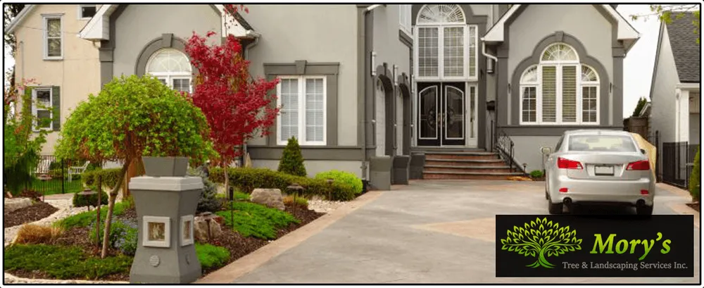 Trusted outdoor landscaping with custom design in Roosevelt, NY by Mory's Tree & Landscaping Services