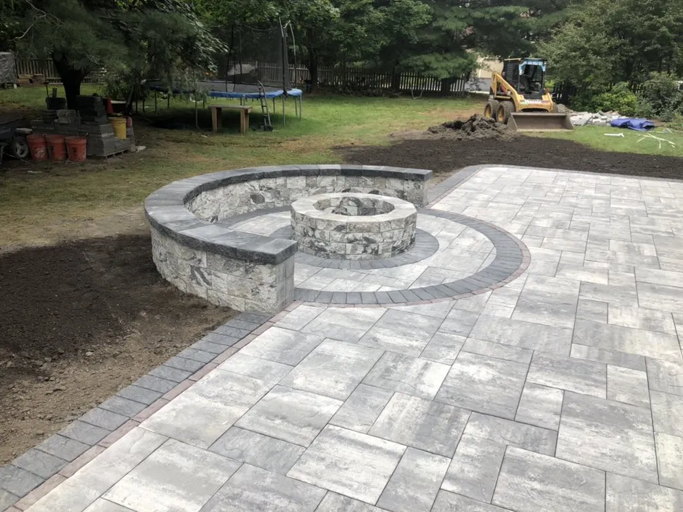 Professional landscape design for year-round maintenance in Bellingham, MA by Mosaic Rock Landscaping