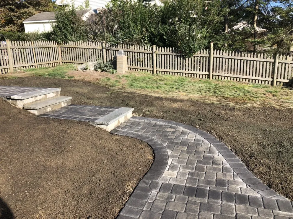 Trusted lawn care service for residential properties across Bellingham, MA - Mosaic Rock Landscaping