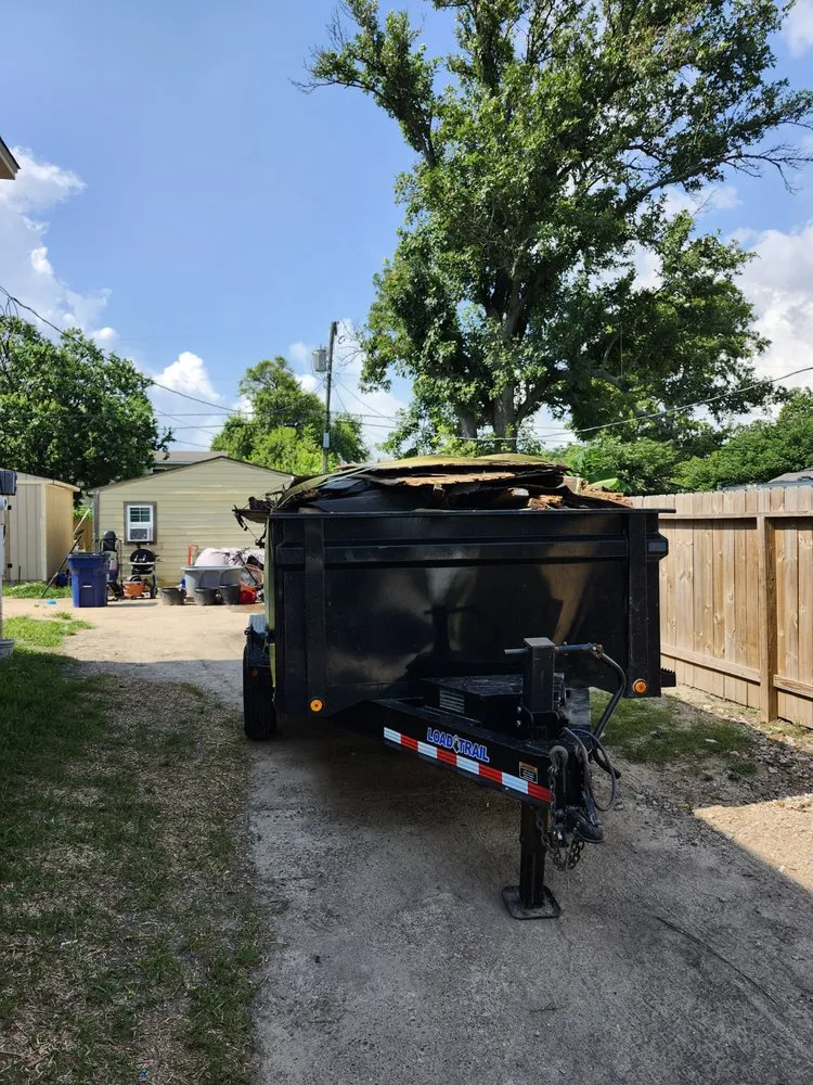 Reliable lawn mowing service for homes in Texas City, TX by Mosby's debris removal