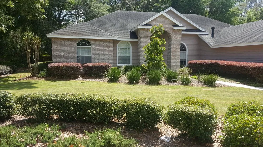 Custom yard maintenance for homes in Archer, FL by Moss Lawn Care