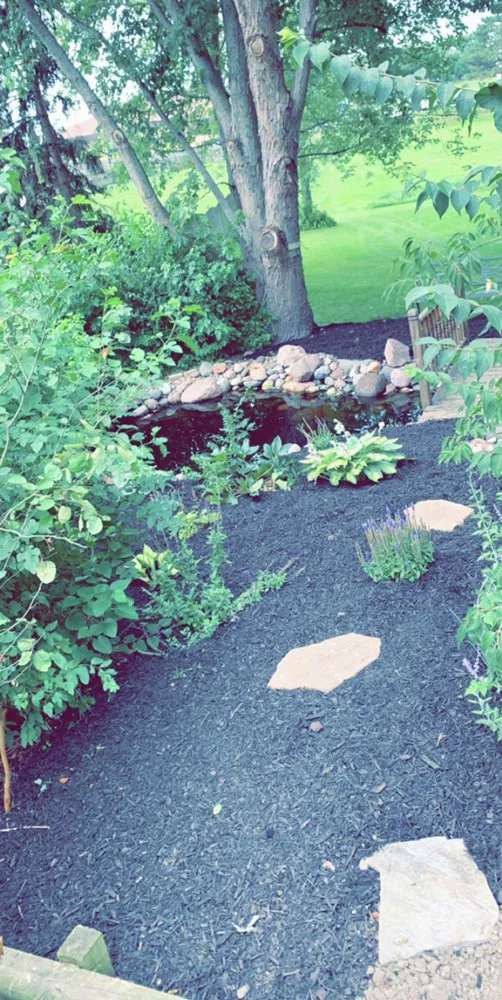 Expert yard maintenance experts serving Crown Point, IN - Moss Lawn Improvement