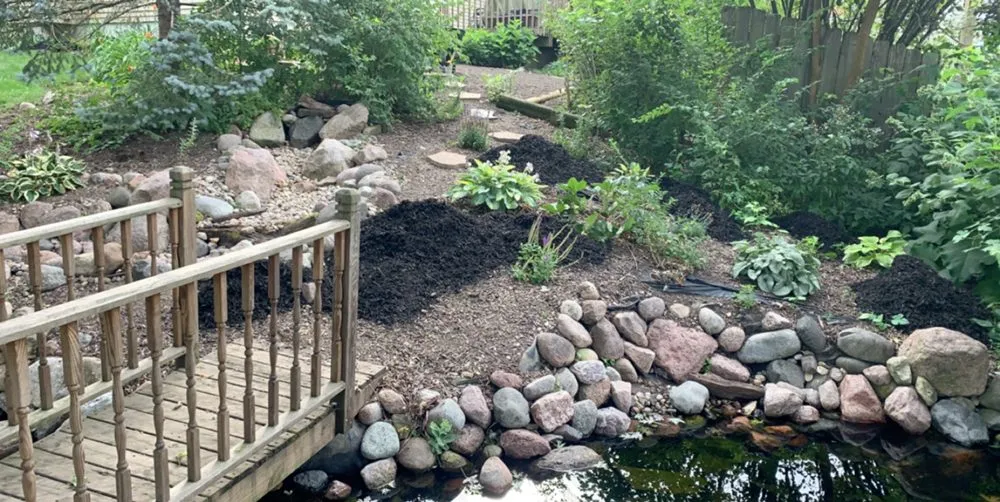 Expert lawn care service for residential properties in Crown Point, IN by Moss Lawn Improvement