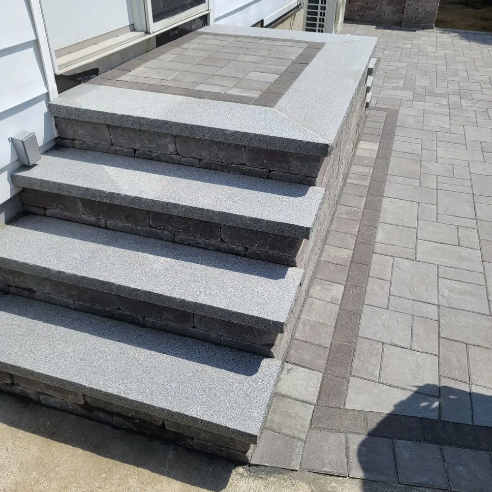 Custom landscape installation for homes across Coventry, RI - Mota's Construction