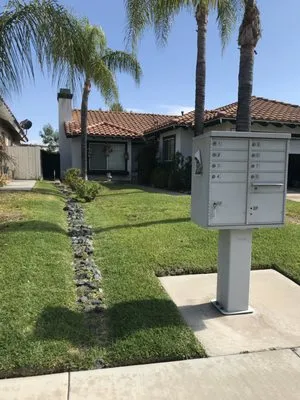 Moto Scapes Lawn Care Logo