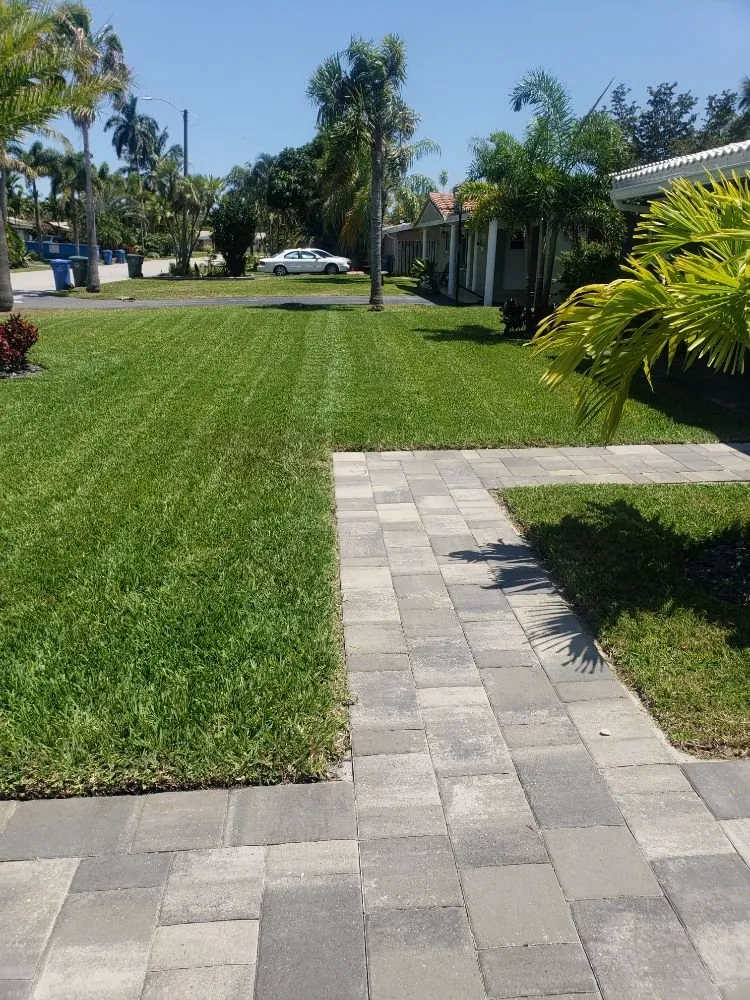 Trusted lawn mowing service in Pompano Beach, FL by Mott's Landscaping and Tree service