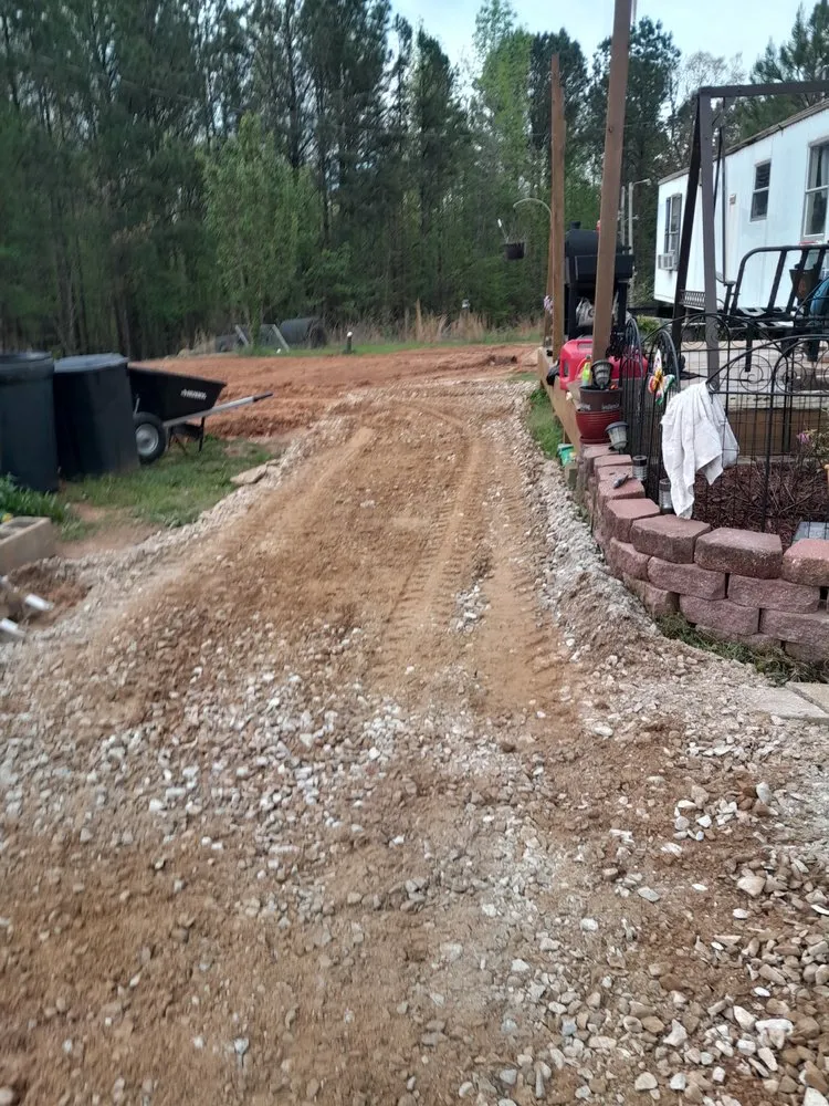 Custom lawn mowing service for year-round maintenance in Temple, GA by Mountain Brook Grading