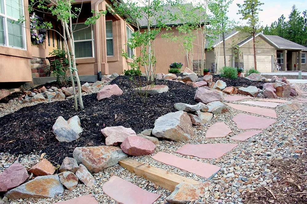 Local outdoor landscaping for year-round maintenance in Woodland Park, CO by Mountain High Creations
