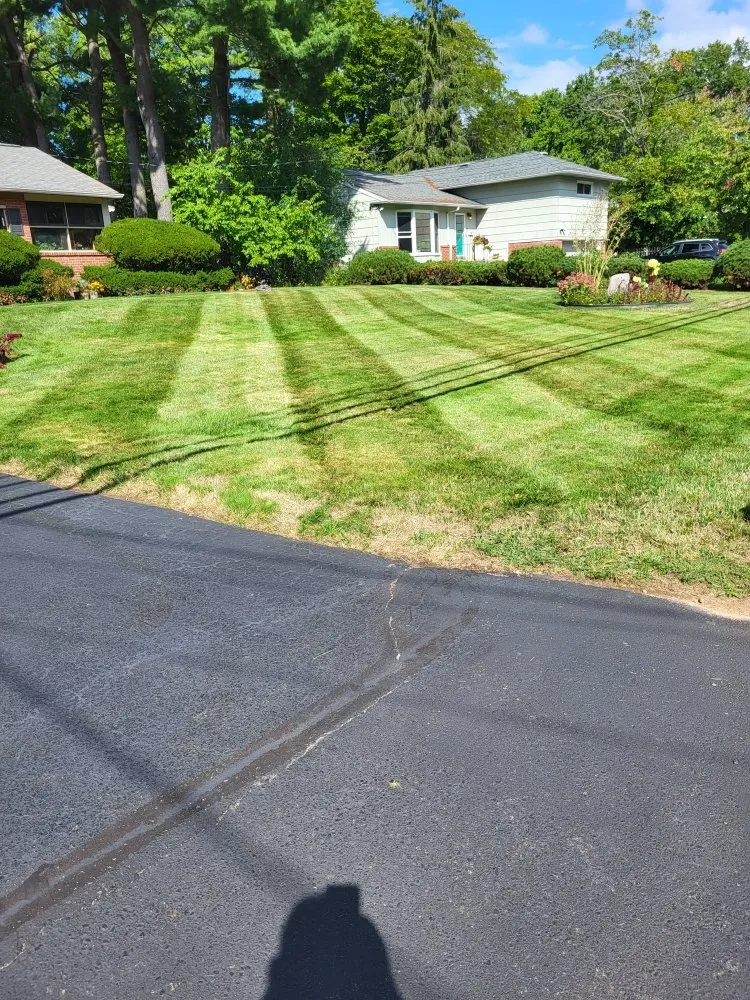 Reliable lawn care service for residential properties in East Hartford, CT by Mountain Hill Lawn Care