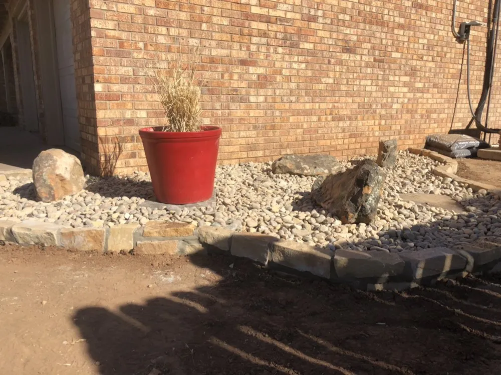 Local landscape installation in Lubbock, TX - Mountain Movers Landscape Fence & Tree