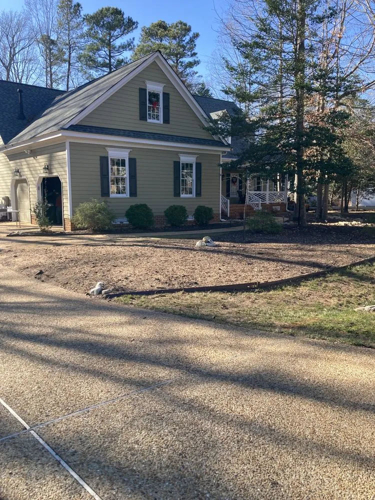 Custom landscape installation in Yorktown, VA by Mountain To Sea Tree Service