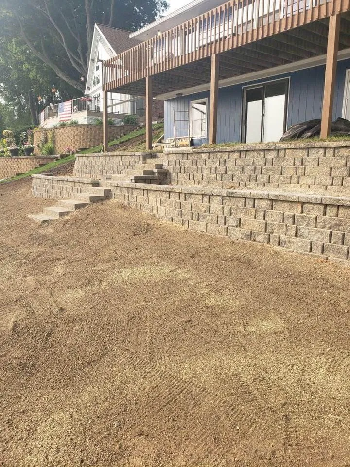 Professional landscape design for residential properties in Evart, MI by Mountains Edge