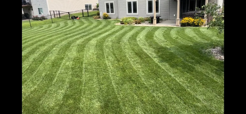 Custom landscape installation in Marion, IA by Mow and Go