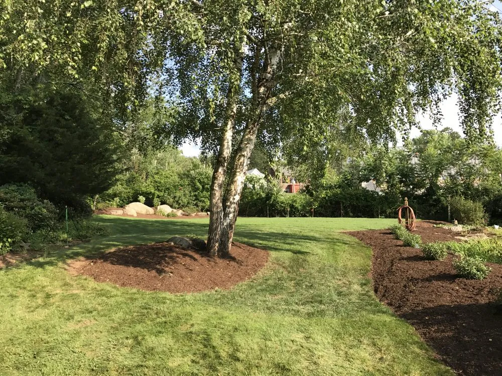 Professional landscape installation in Framingham, MA by Mow and Grow Lawn Services