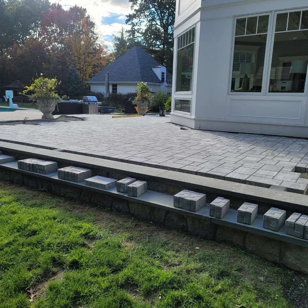Expert landscape installation for homes in Framingham, MA by Mow and Grow Lawn Services