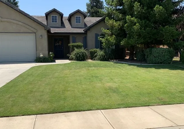 Affordable lawn care service for homes in Centerton, AR by Mow Joe Lawn Care