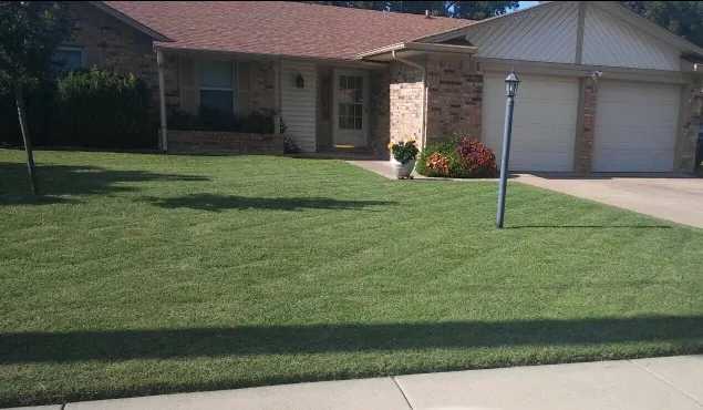 Custom landscape design for year-round maintenance in Spencer, OK by Mow Managers