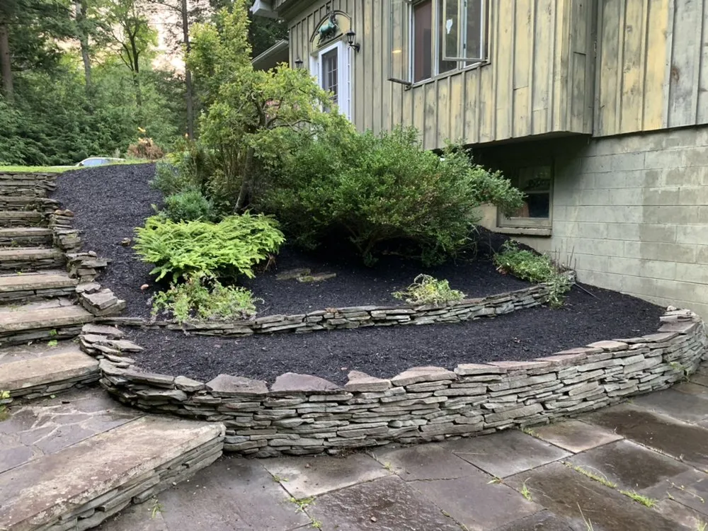 Expert landscape installation for beautiful yards in Glens Falls, NY by Mow 'N' Goers