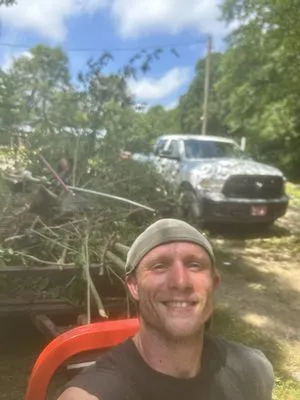 Mowin with Spence Logo