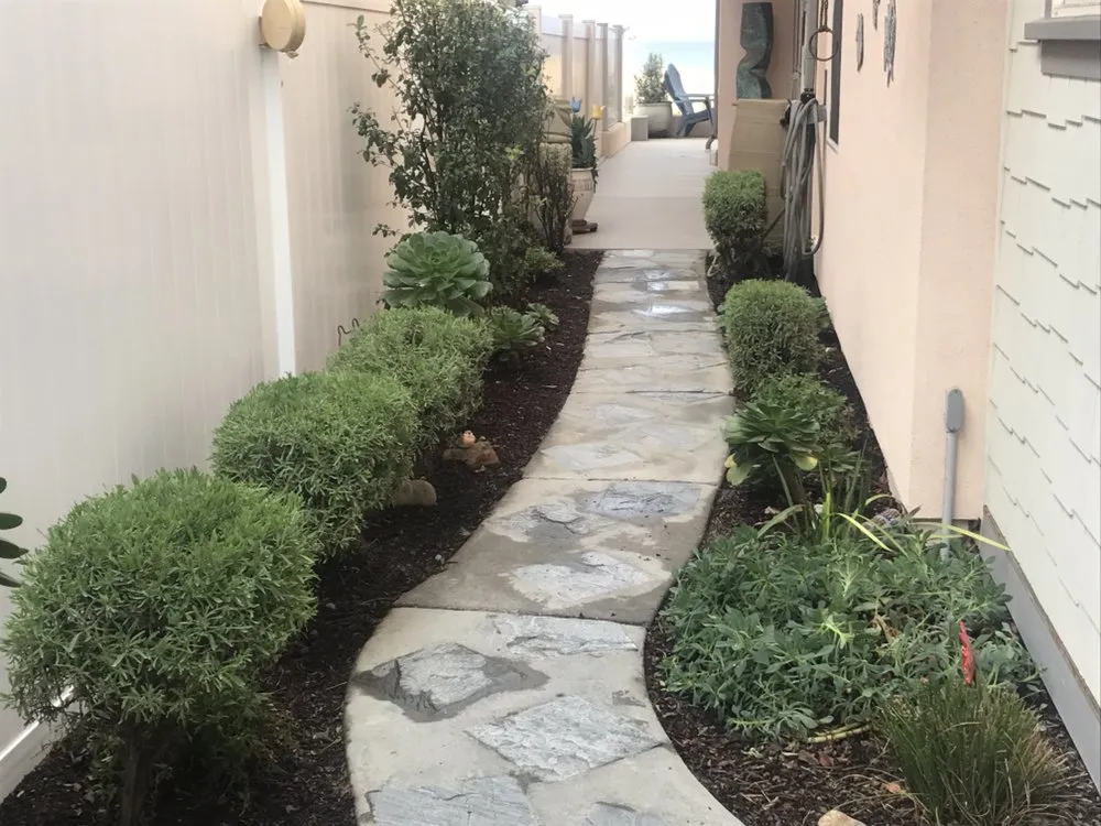 Custom landscape installation in Grover Beach, CA by Mowing Ape Yard Care