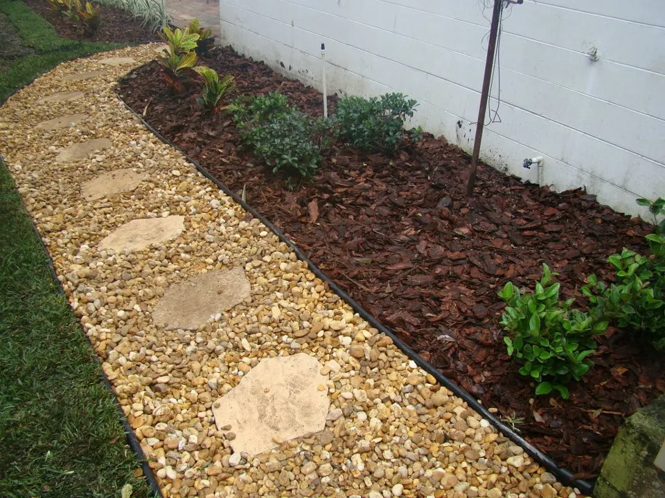 Custom landscape installation in Land O Lakes, FL by Mow'n By Bowen