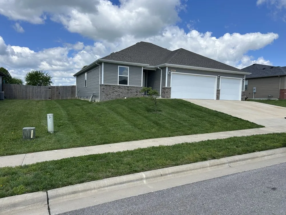 Professional landscape design for residential properties in Republic, MO by Mowraculous