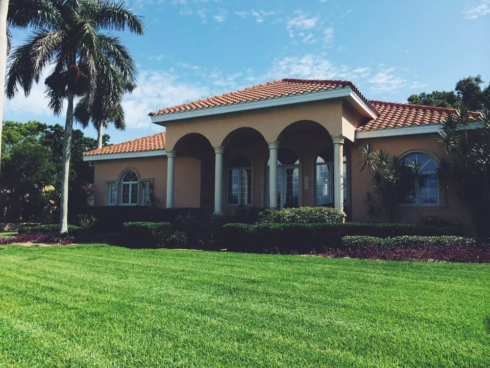 Professional landscape installation with custom design in Bradenton, FL by Mowses Lawn Care