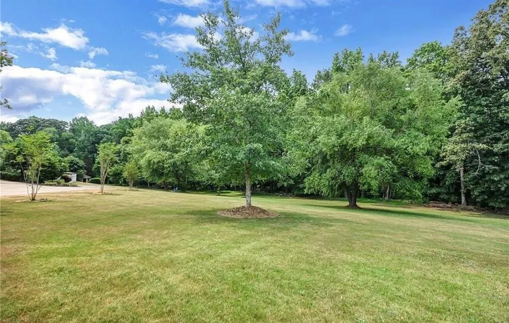 Affordable landscape installation in Powder Springs, GA by Mowtown Lawn Care