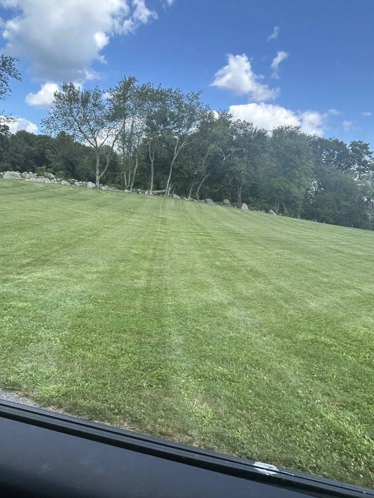 Custom landscaping services for residential properties in Woodstock, CT by Mr Green Turf