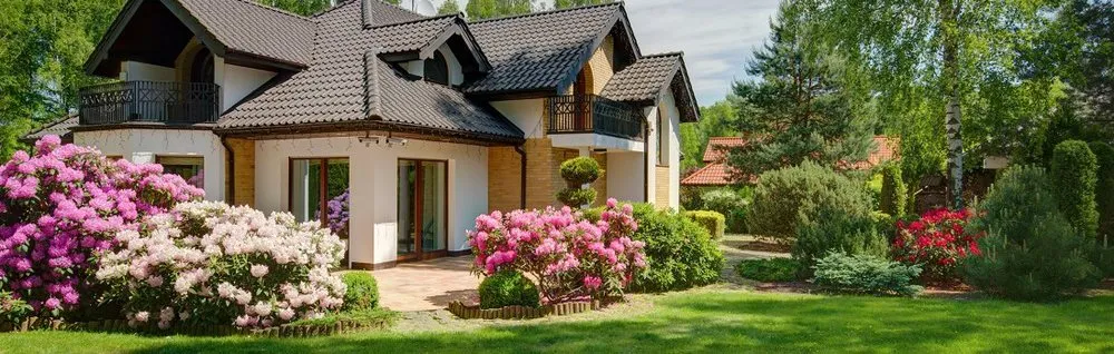 Trusted lawn care service for residential properties across Sarasota, FL - Mr. Greenjeans Inc Tree Surgeons & Landscape Design