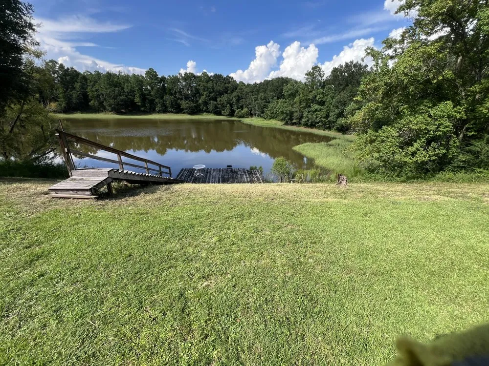 Local yard cleanup service for residential properties in Pensacola, FL by Mr Landscaping