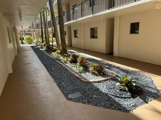 Mr Rogers Landscape Service Logo