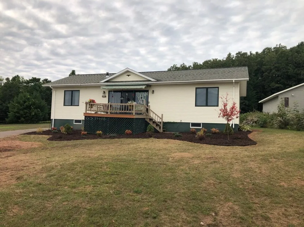 Reliable lawn mowing service with custom design in Washburn, WI by Mr Window