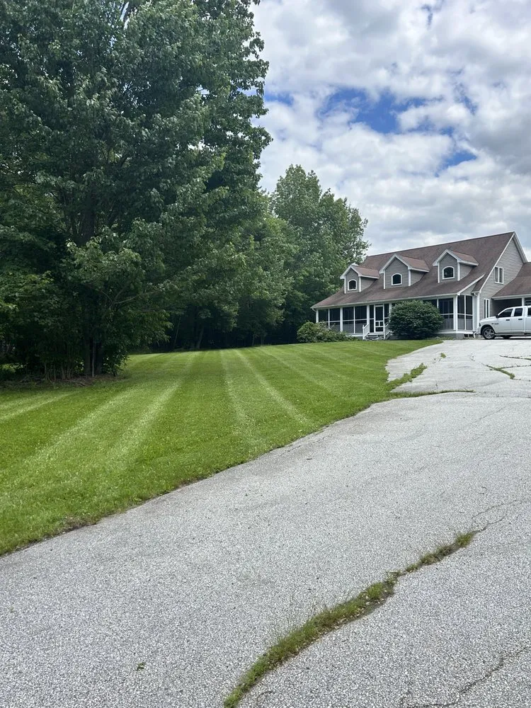 Professional lawn mowing service for year-round maintenance in Bangor, ME by MRB Line Striping