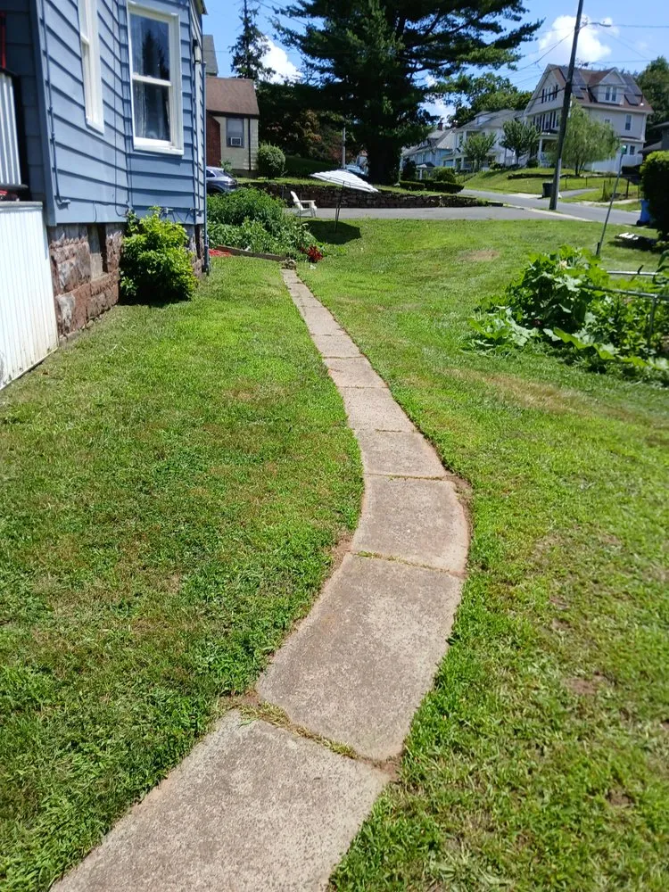 Custom landscape installation in Windsor, CT by Mr.Cheap & Neat Landscaping and Detailing