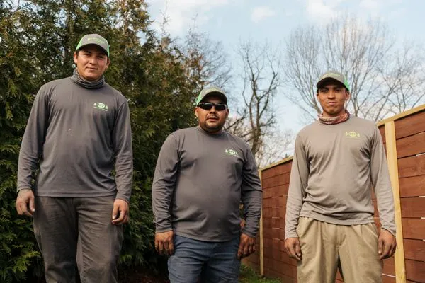 MT Landscaping and Lawncare Logo