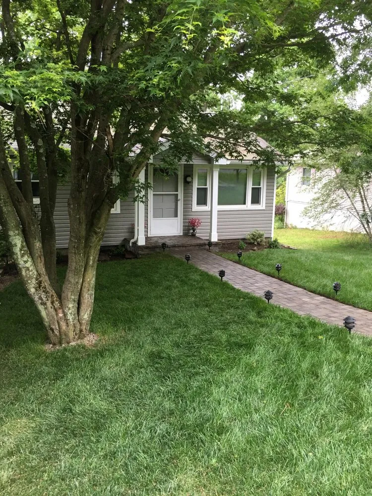 Professional yard cleanup service for homes in Highland Mills, NY by MTTJ Property Maintenance