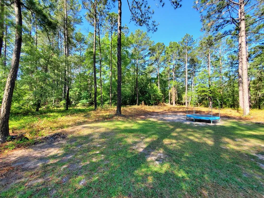 Custom lawn care service near you across Blythewood, SC - Muddy Paws Landscaping and Land Management