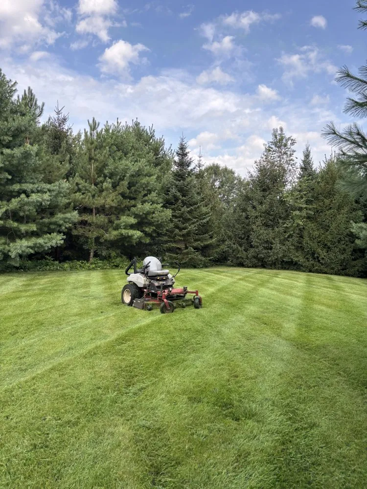 Reliable lawn mowing service for homes in Fountain City, WI by Mueller Lawn and Landscaping