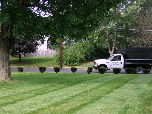 Expert outdoor landscaping in Needham, MA - Muir Bros Landscaping and Snowplowing