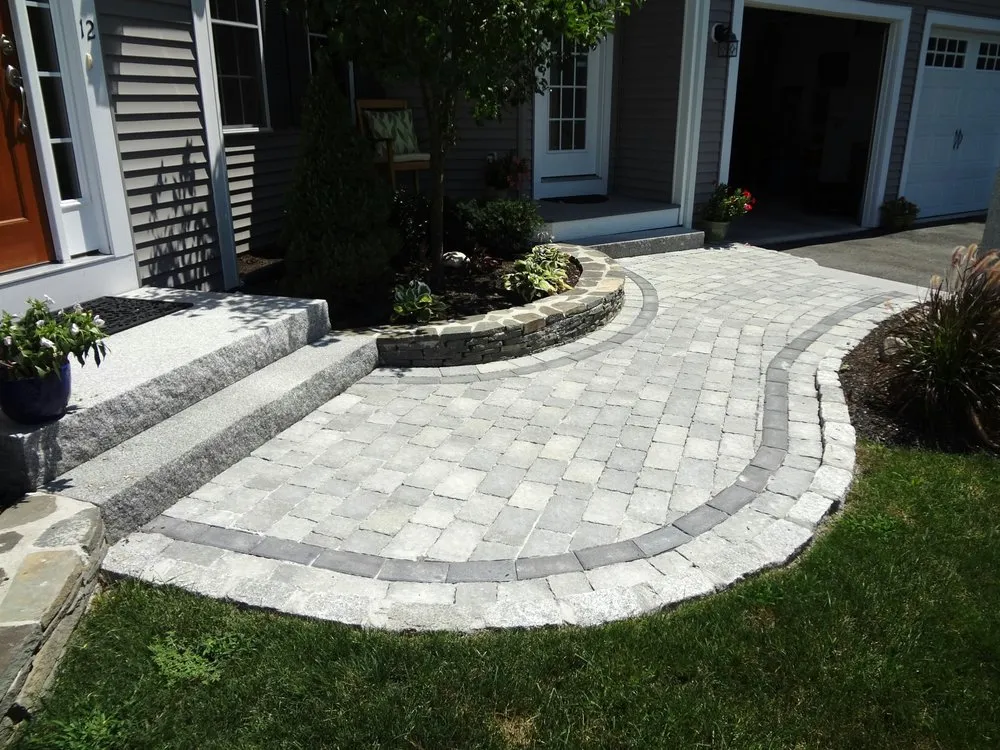 Top-rated lawn mowing service in Needham, MA - Muir Bros Landscaping and Snowplowing