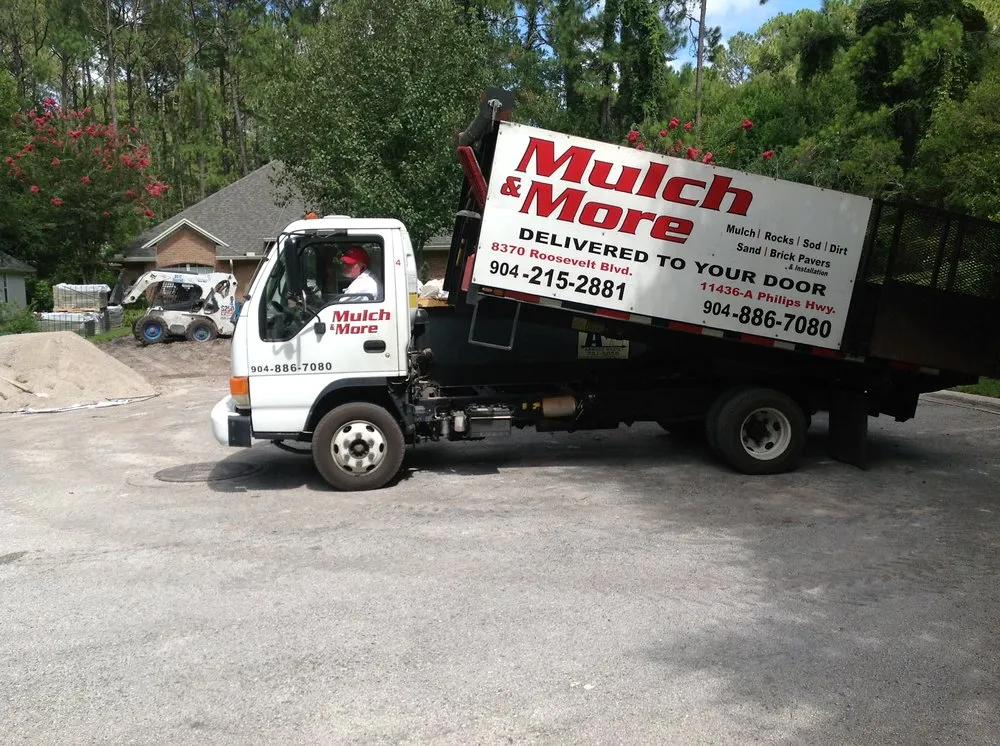 Professional lawn mowing service for outdoor upgrades in Ponte Vedra Beach, FL by Mulch & More
