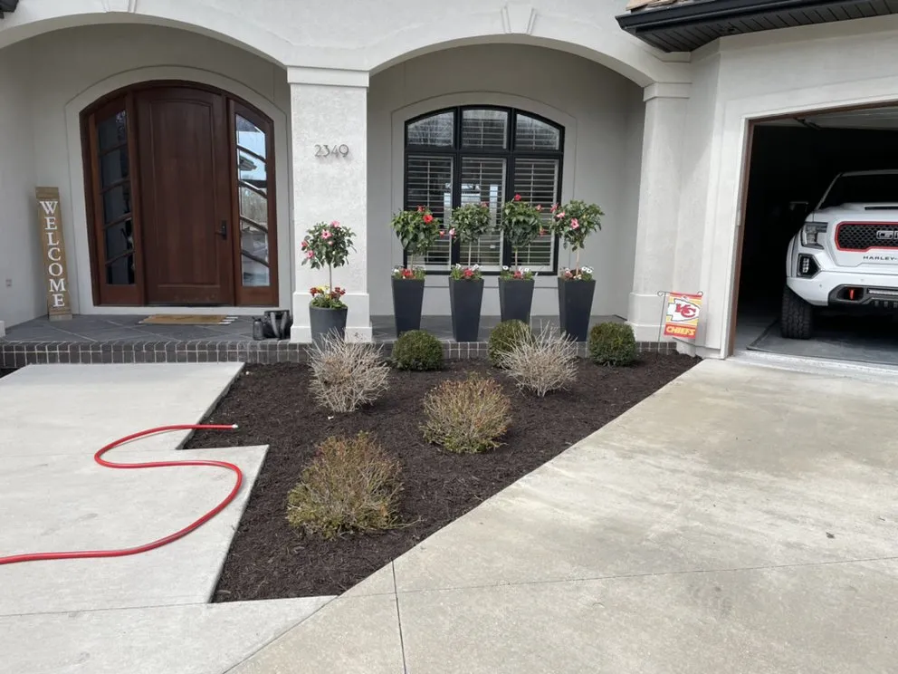 Trusted landscaping services for year-round maintenance in Lee's Summit, MO by MULCH KC