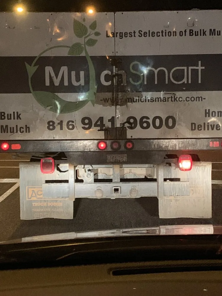 Custom landscape installation with custom design in Grandview, MO by Mulch Smart