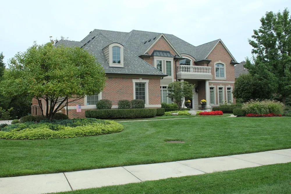 Reliable lawn care service for homes in Utica, MI by Munaco Landscape