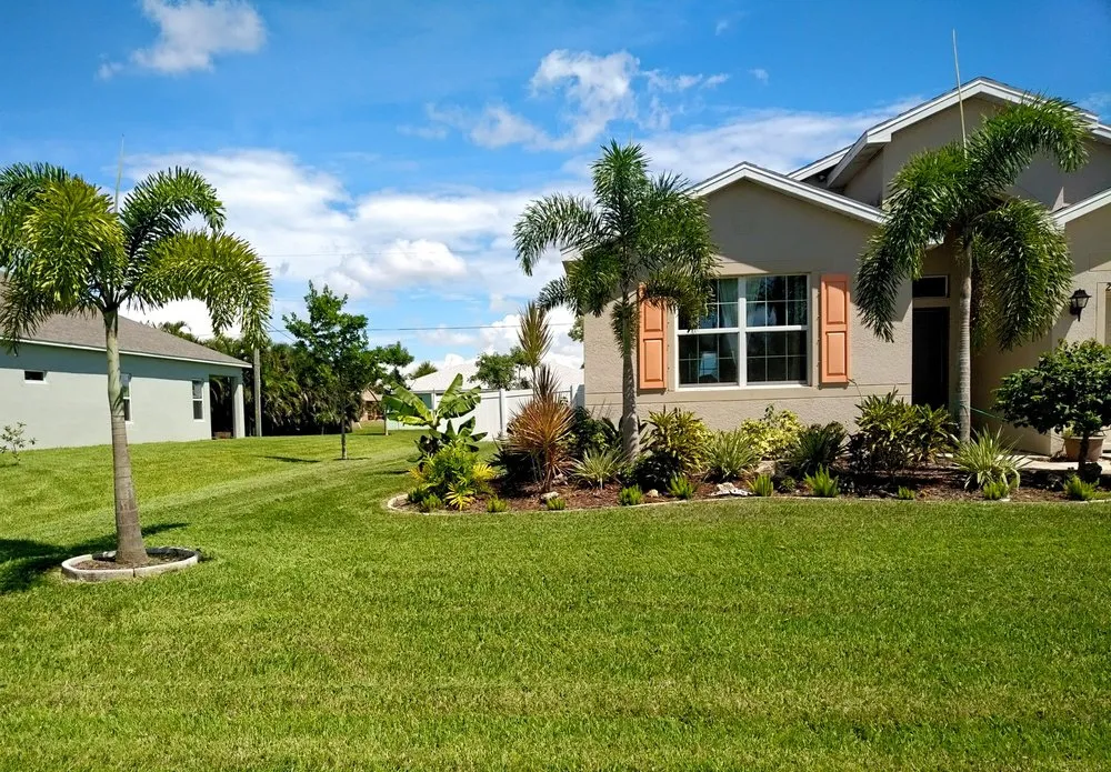 Custom garden landscaping for residential properties across Cape Coral, FL - Munching Monster Lawn Services