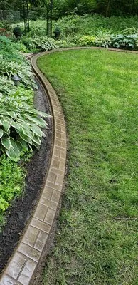 Munoz Concrete & General Construction Logo