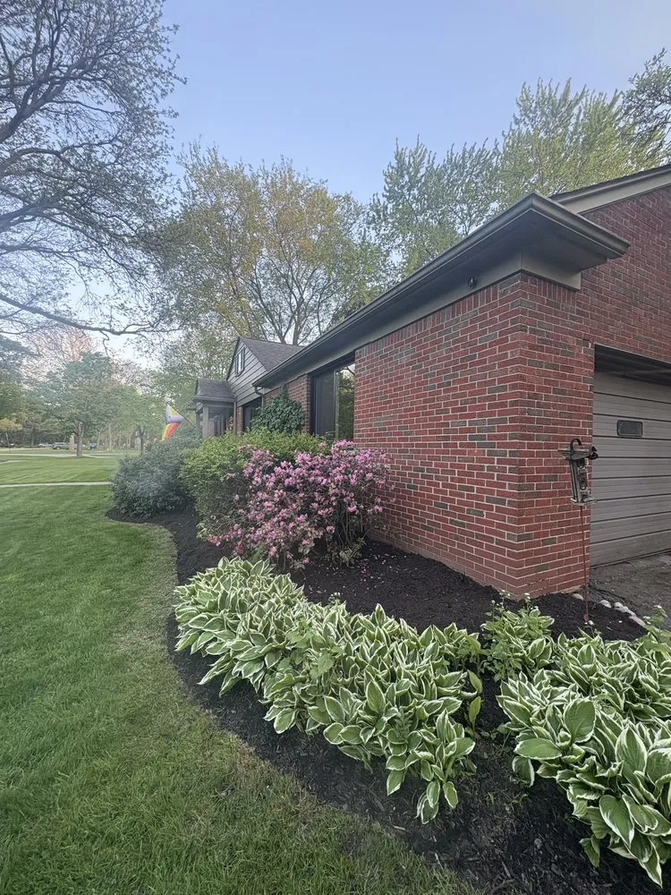 Trusted lawn mowing service for homes in Detroit, MI by Murray Family Landscaping