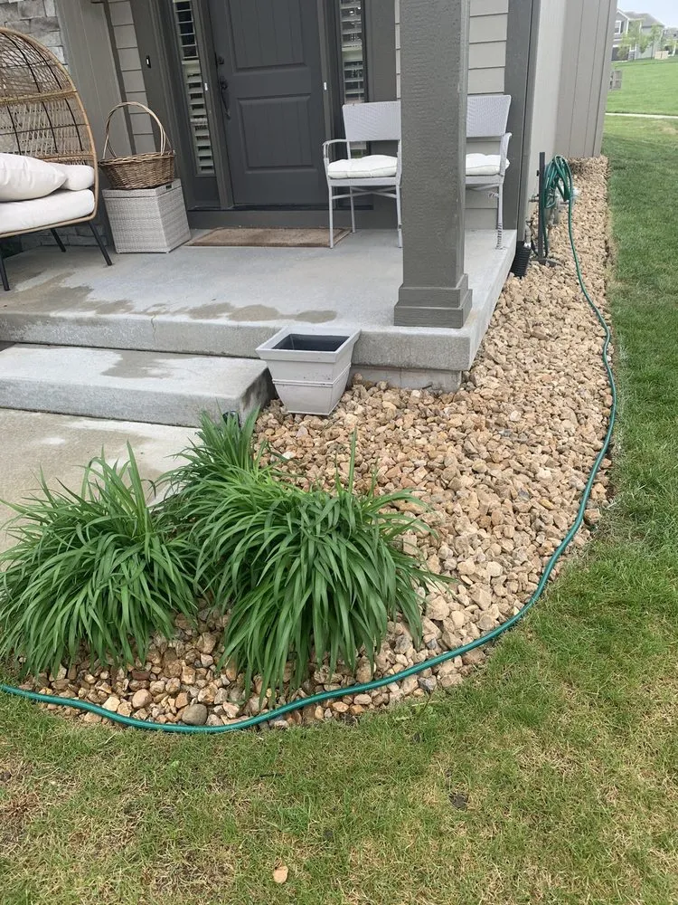 Custom outdoor landscaping in Olathe, KS by MW Lawn & Landscape