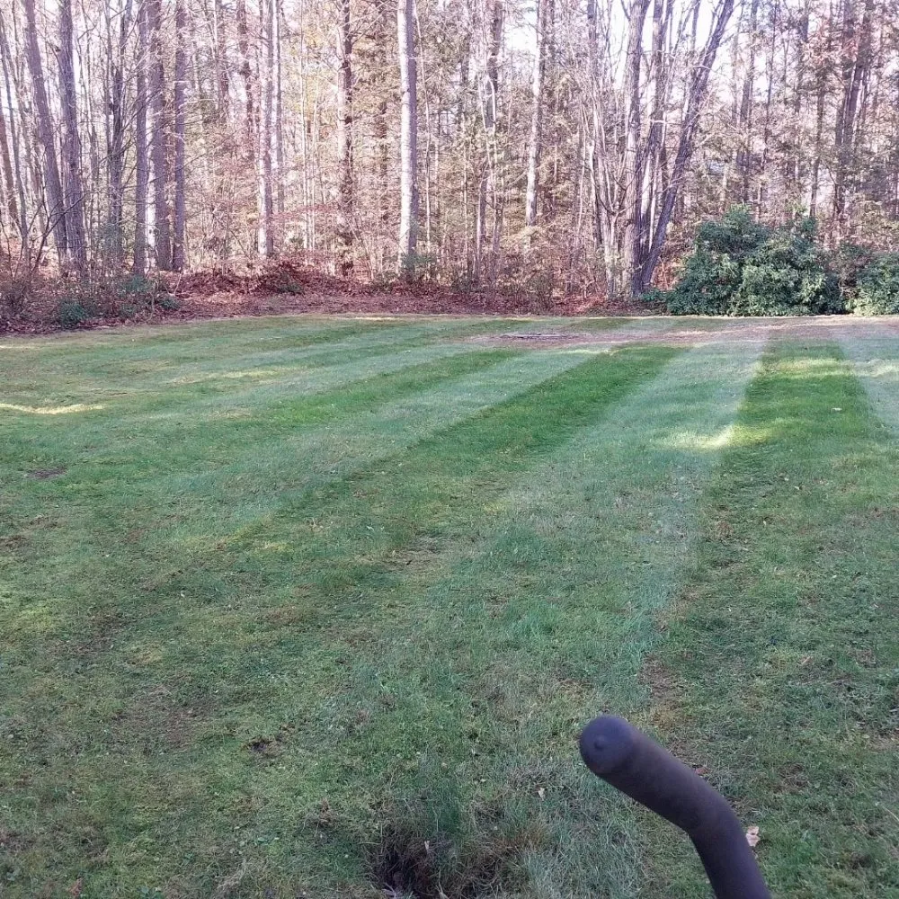 Custom landscape design for year-round maintenance across Manchester, NH - Myette Lawn And Home Services